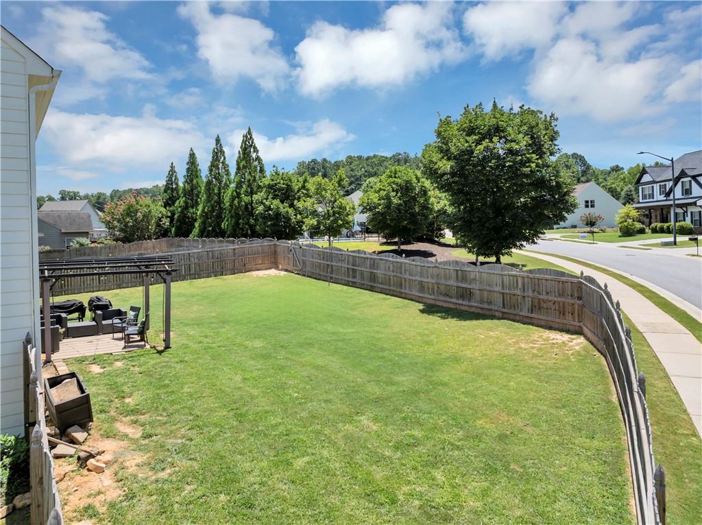 210 Creek View Lane Acworth, GA 30102 - Photo 39 of 48 a view of a swimming pool with a yard