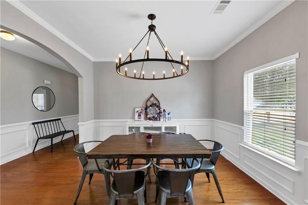210 Creek View Lane Acworth, GA 30102 - Photo 9 of 48 a view of a dining room with furniture window and wooden floor