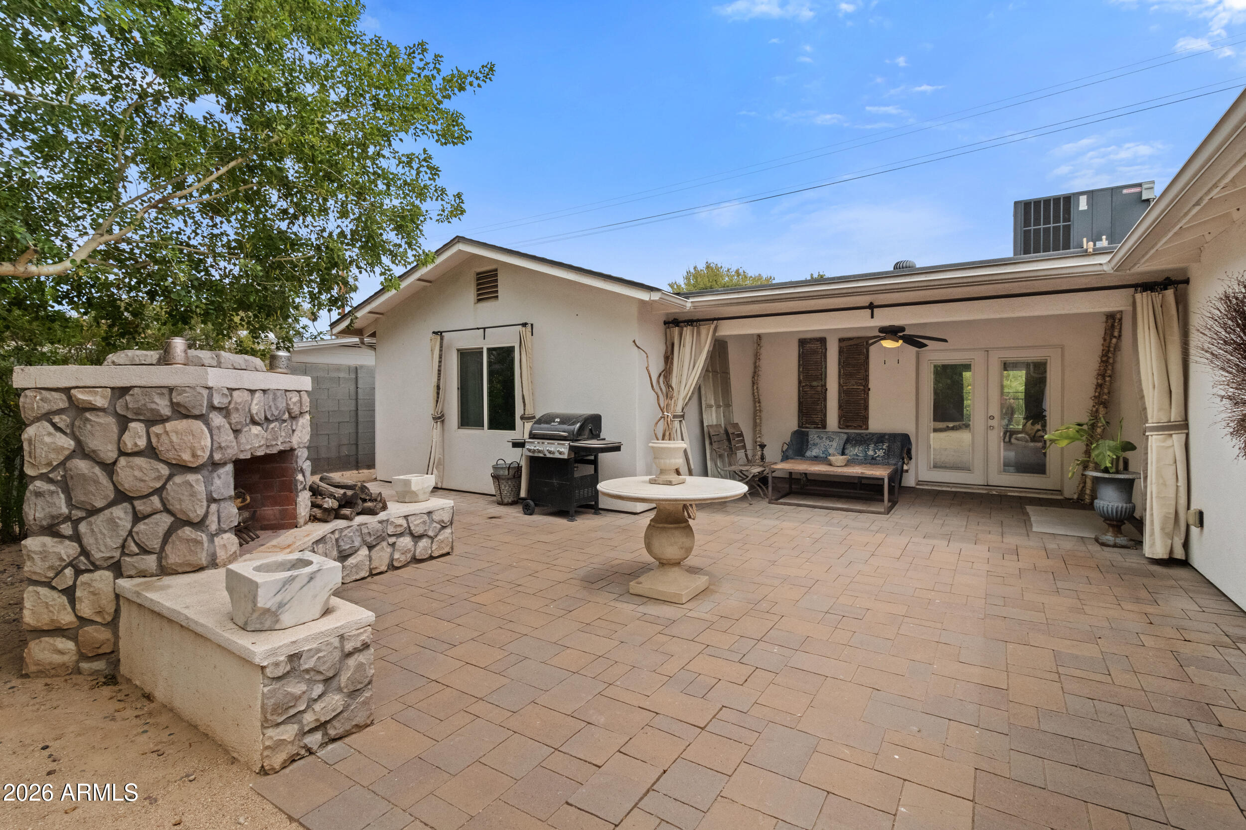 4025 East Osborn Road Phoenix, AZ 85018 - Photo 36 of 44 Backyard Fireplace