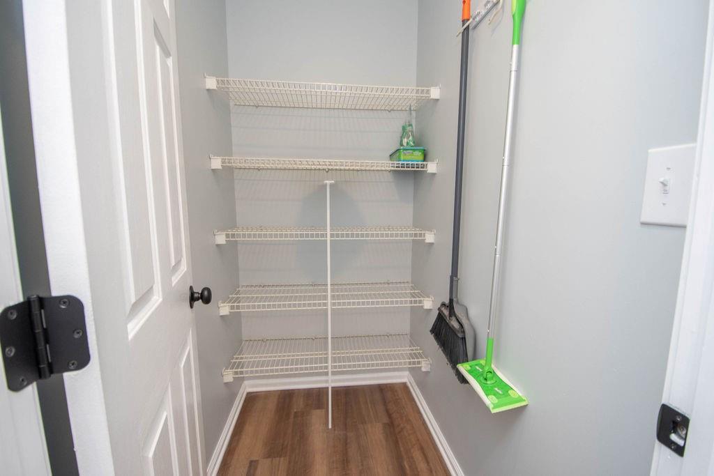 75 Bretts Bend Sharpsburg, GA 30277 - Photo 14 of 39 a view of a closet with wooden floor