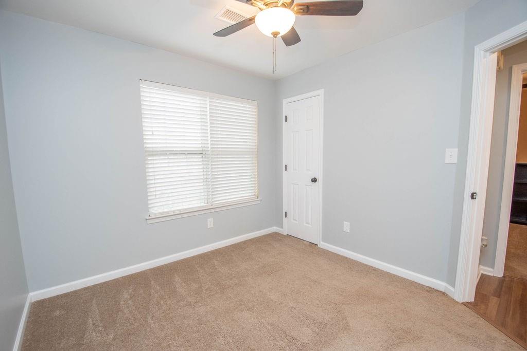 75 Bretts Bend Sharpsburg, GA 30277 - Photo 21 of 39 a view of an empty room with a window