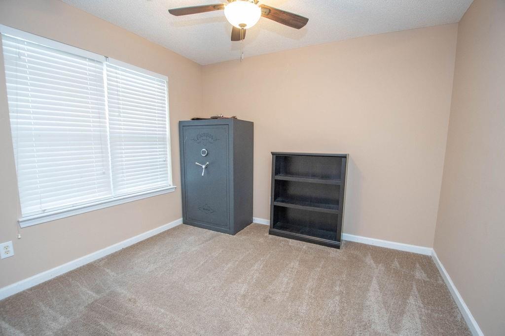 75 Bretts Bend Sharpsburg, GA 30277 - Photo 23 of 39 a view of an empty room with a window