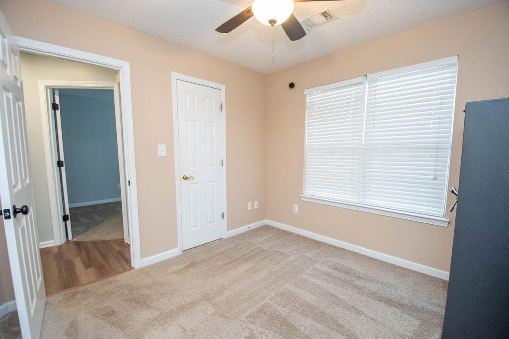 75 Bretts Bend Sharpsburg, GA 30277 - Photo 24 of 39 a view of an empty room with a window