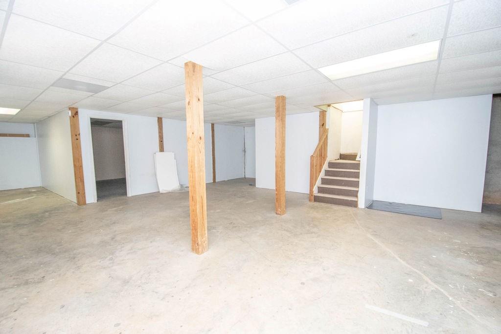 75 Bretts Bend Sharpsburg, GA 30277 - Photo 25 of 39 a view of a room with stairs and a window