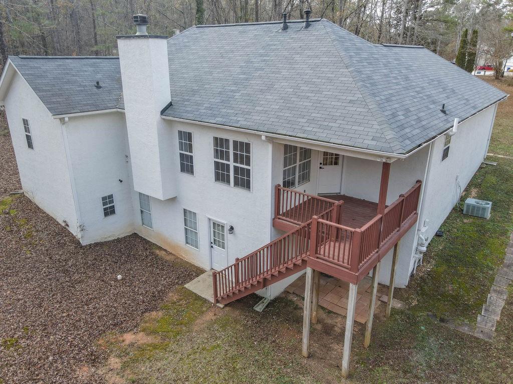 75 Bretts Bend Sharpsburg, GA 30277 - Photo 38 of 39 a aerial view of a house with a yard and deck
