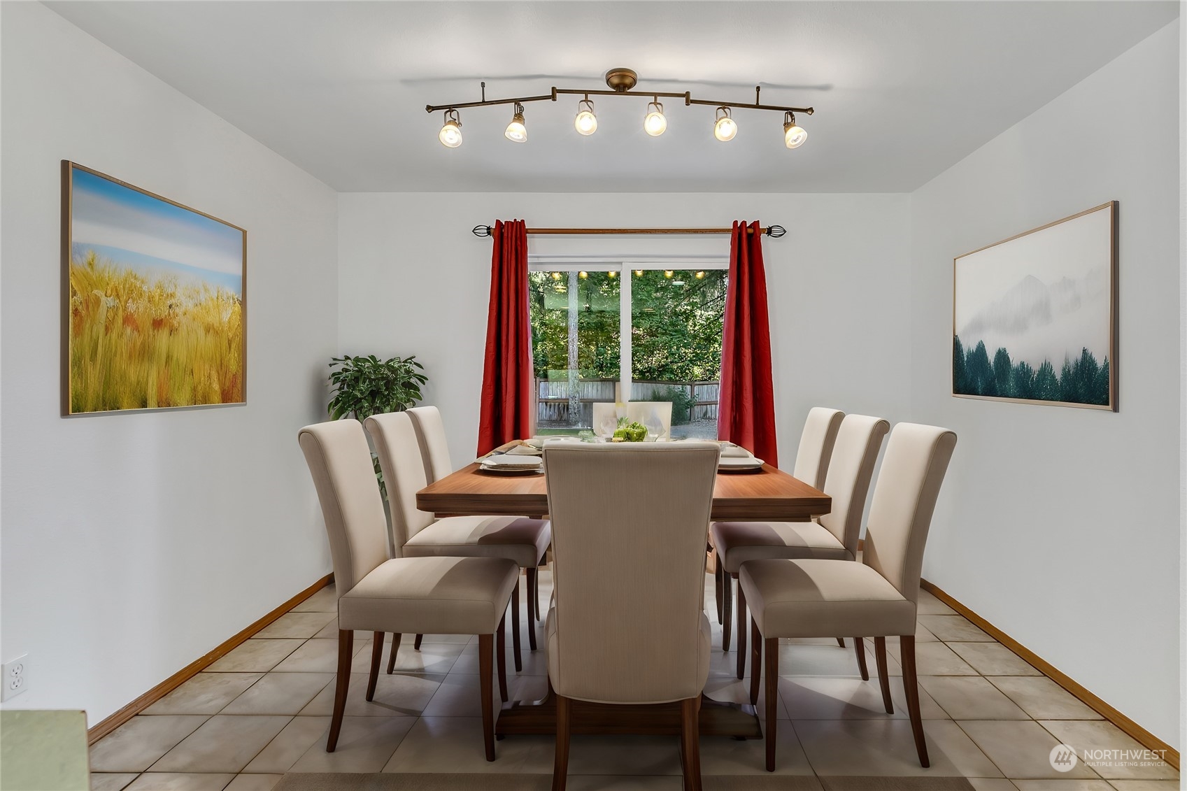 17545 Loop Lane Southeast Yelm, WA 98597 - Photo 12 of 35 a view of a dining room with furniture window and outside view