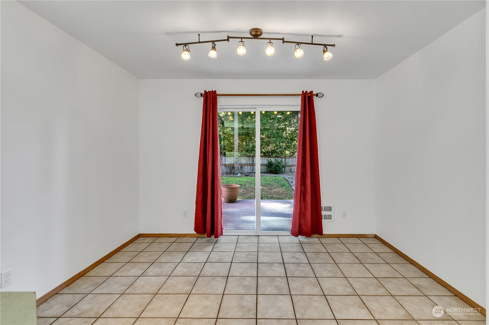 17545 Loop Lane Southeast Yelm, WA 98597 - Photo 13 of 35 a view of an empty room with a window