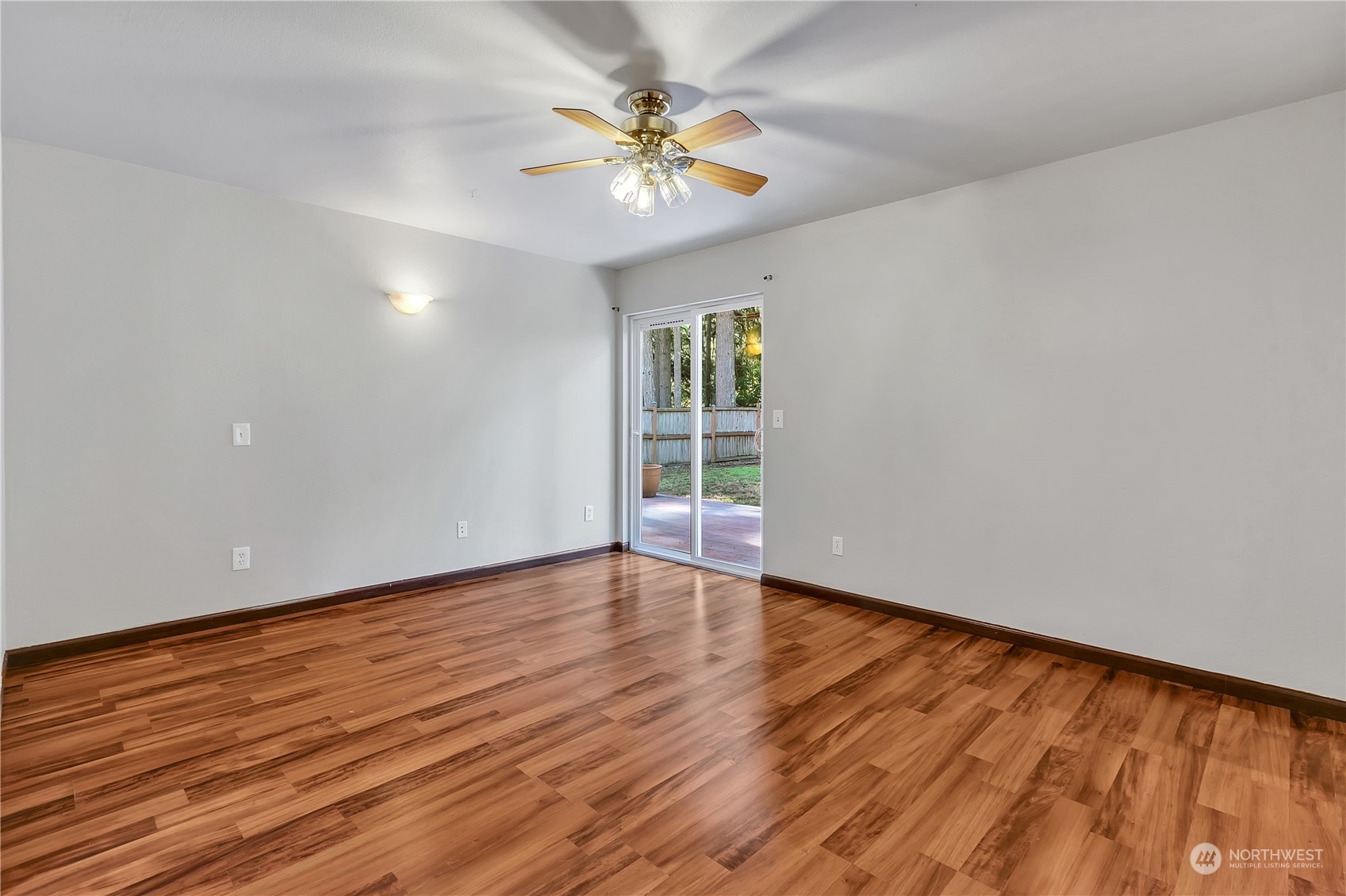 17545 Loop Lane Southeast Yelm, WA 98597 - Photo 17 of 35 wooden floor in an empty room with a window