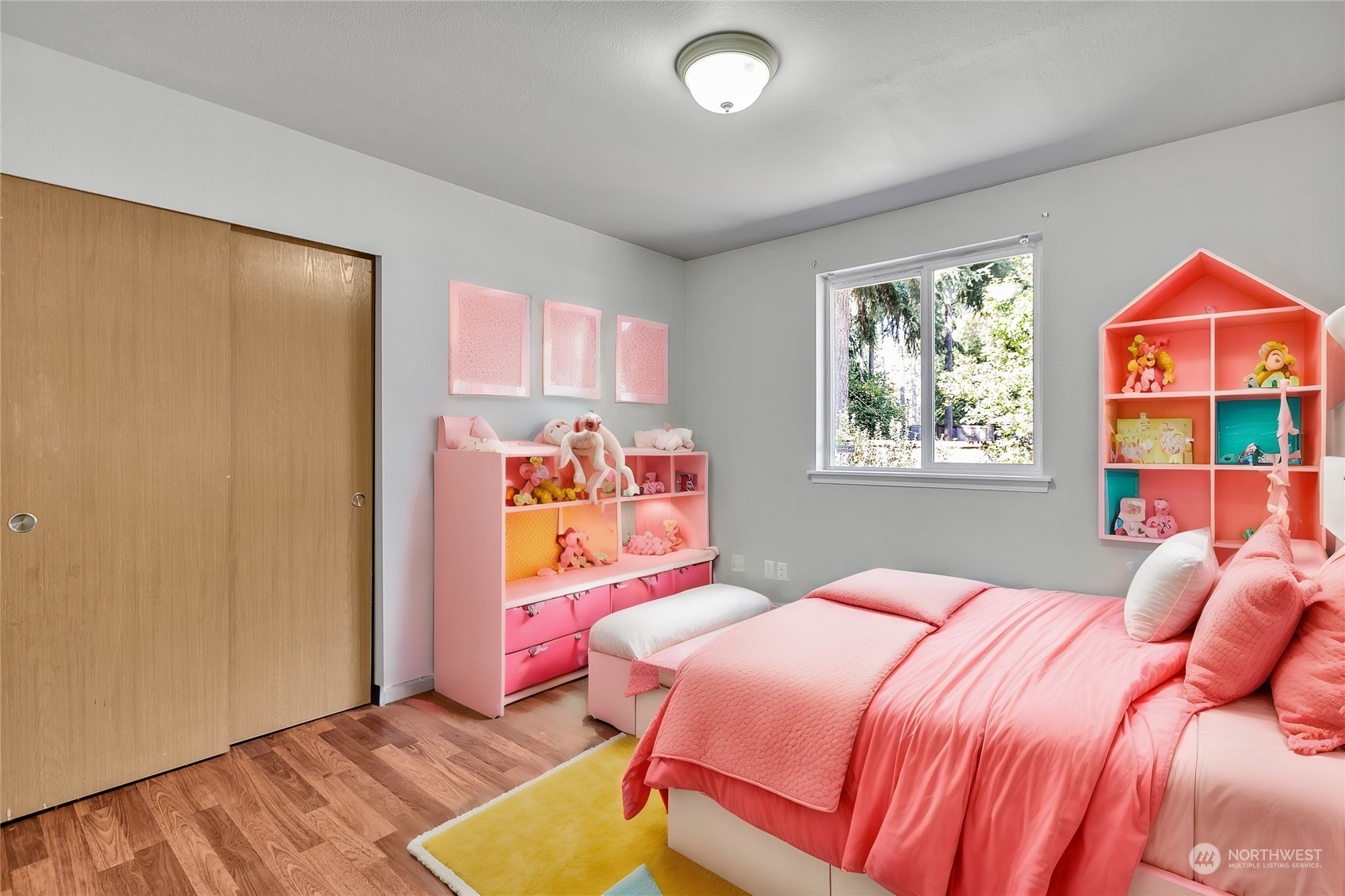 17545 Loop Lane Southeast Yelm, WA 98597 - Photo 24 of 35 a bedroom with a bed and a window