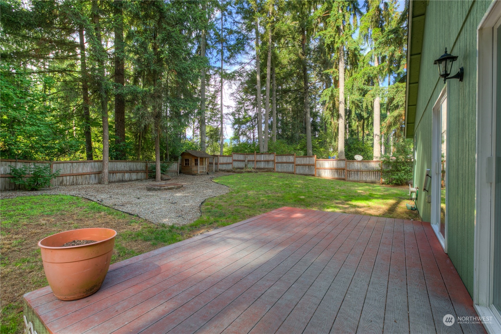 17545 Loop Lane Southeast Yelm, WA 98597 - Photo 26 of 35 a view of a backyard with a garden