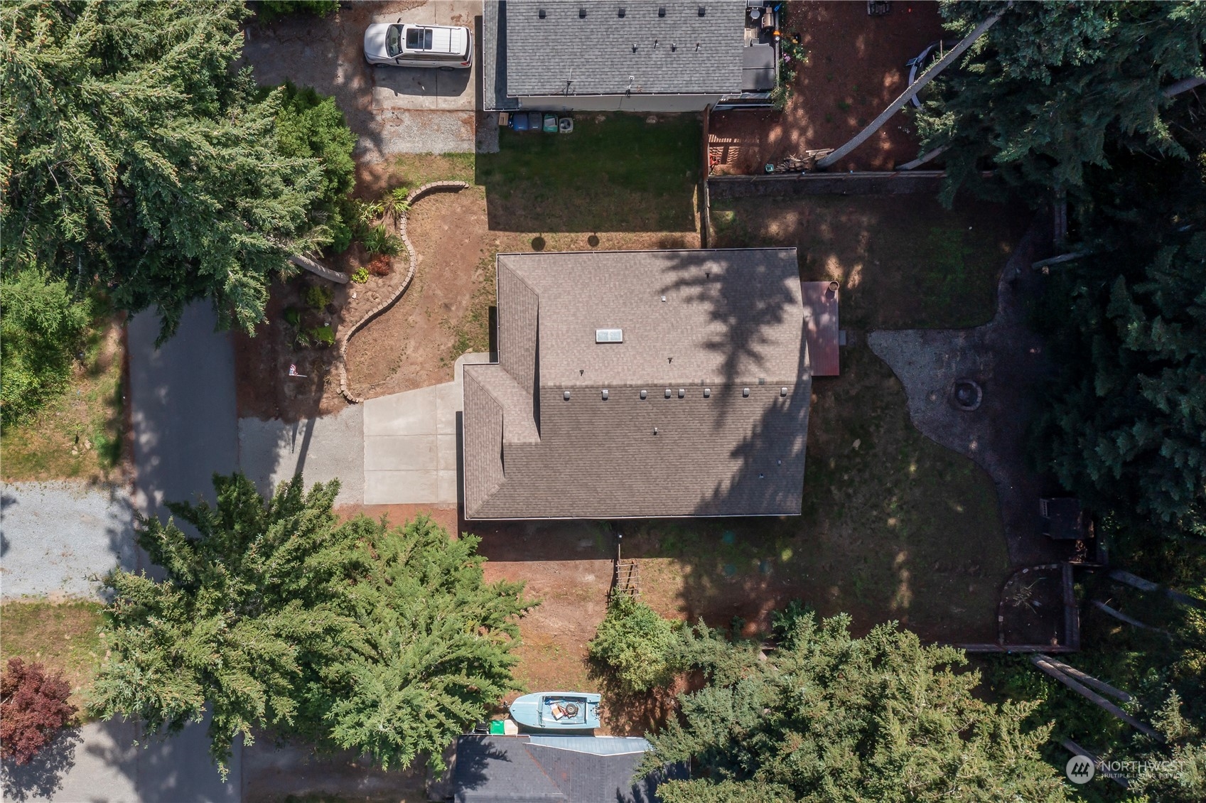 17545 Loop Lane Southeast Yelm, WA 98597 - Photo 34 of 35 an aerial view of a house with a yard