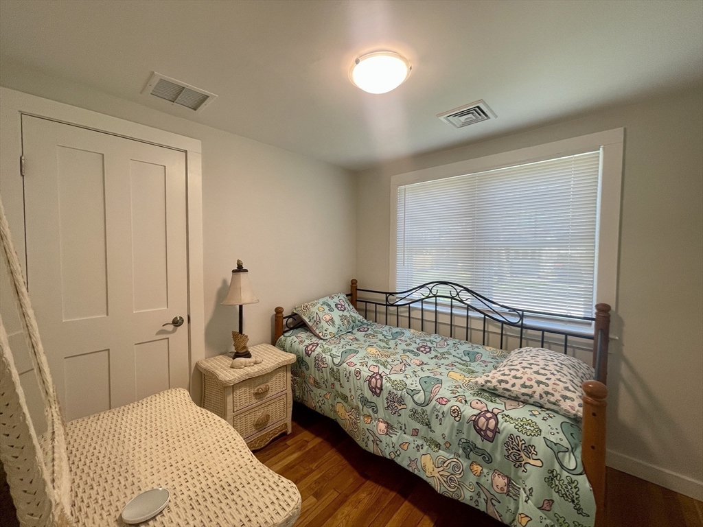 91 Martin Street Wareham, MA 02532 - Photo 15 of 25 a bedroom with 2 bed and a window