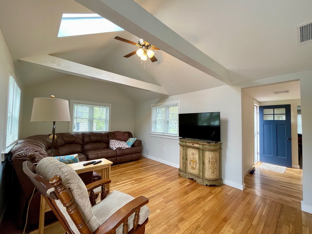91 Martin Street Wareham, MA 02532 - Photo 10 of 25 a living room with furniture and a flat screen tv