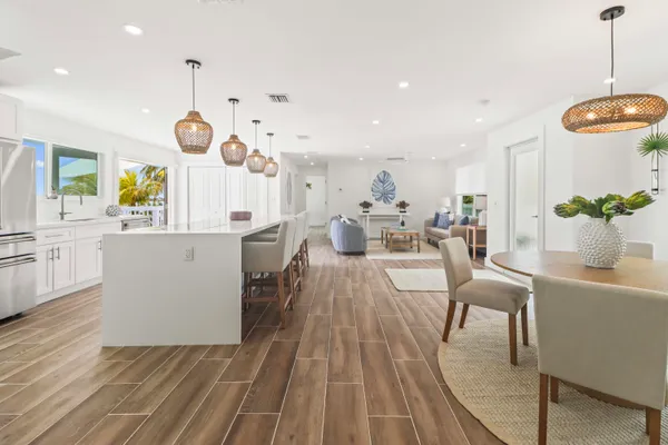 a bathroom with a double vanity sink and mirror
