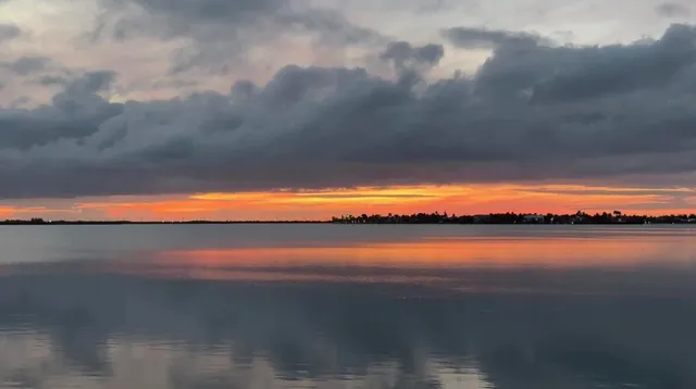 a view of balcony with furniture