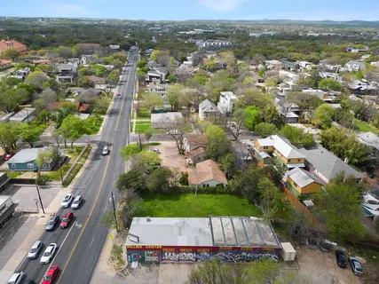 an aerial view of a house with a garden