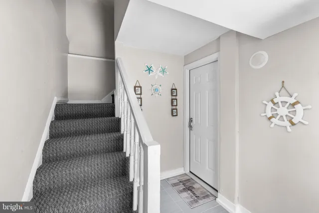 a view of entryway with stairs