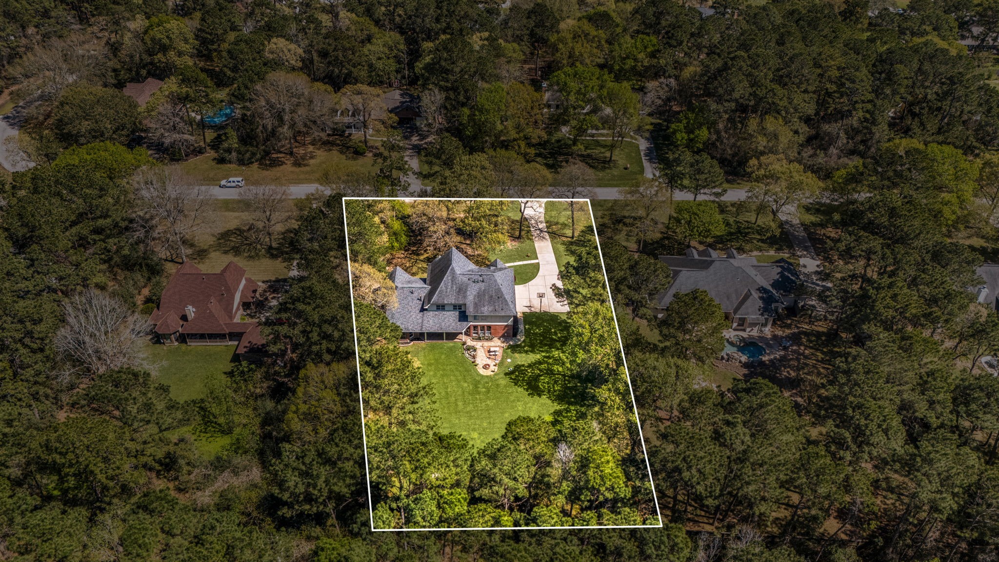 14419 Timbergreen Drive Magnolia, TX 77355 - Photo 37 of 43 Aerial view with property boundaries outlined, showcasing the large homesite surrounded by mature trees and offering a private, spacious setting.