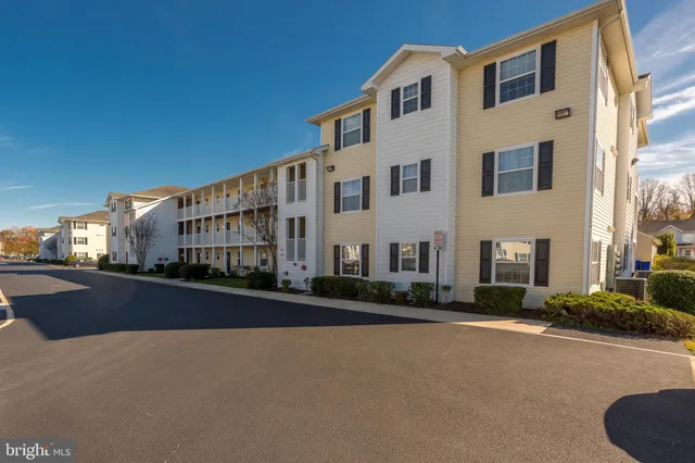 a view of a building with a street