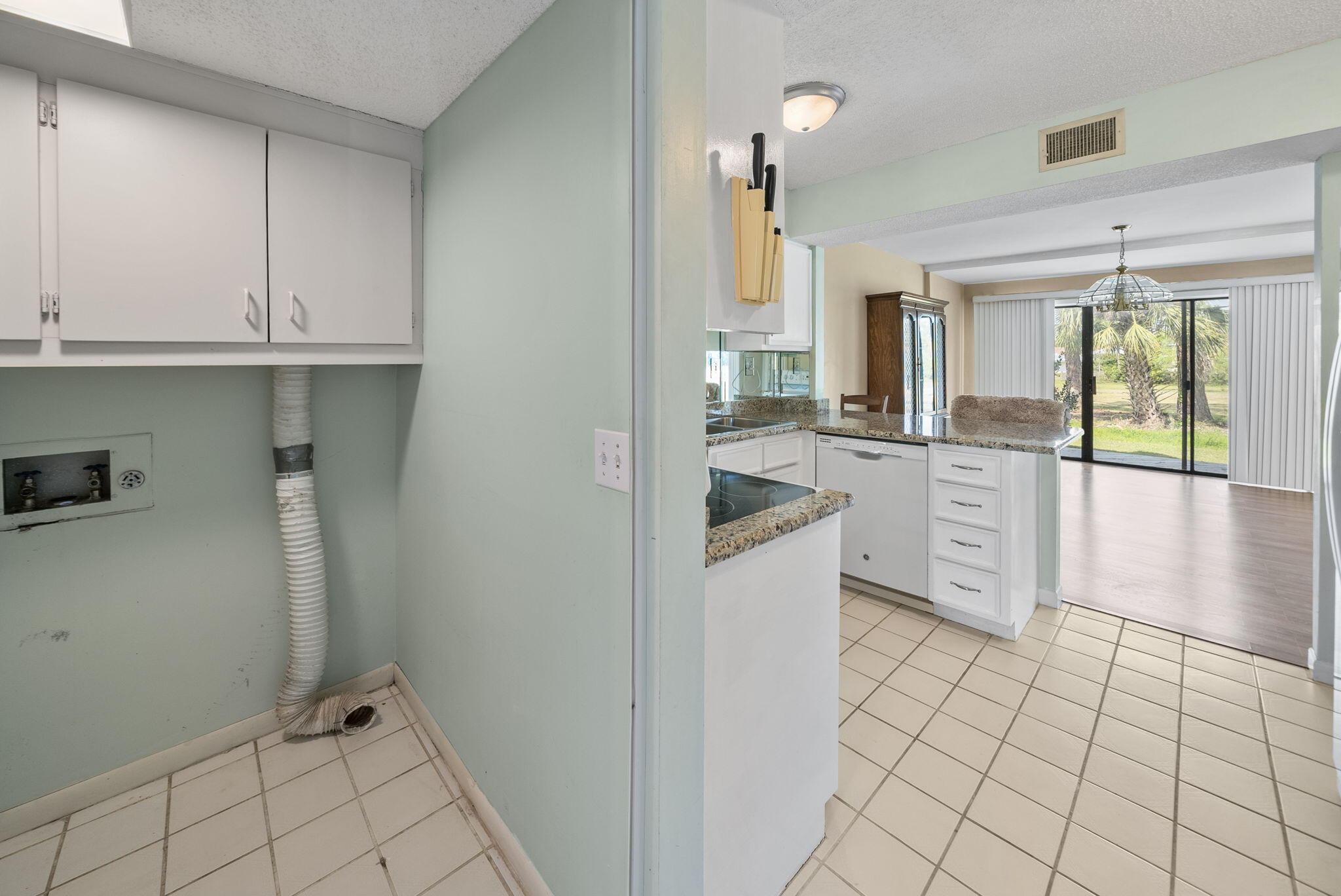 4300 Bay Point Road, Unit 408 Panama City Beach, FL 32408 - Photo 10 of 32 Laundry Room