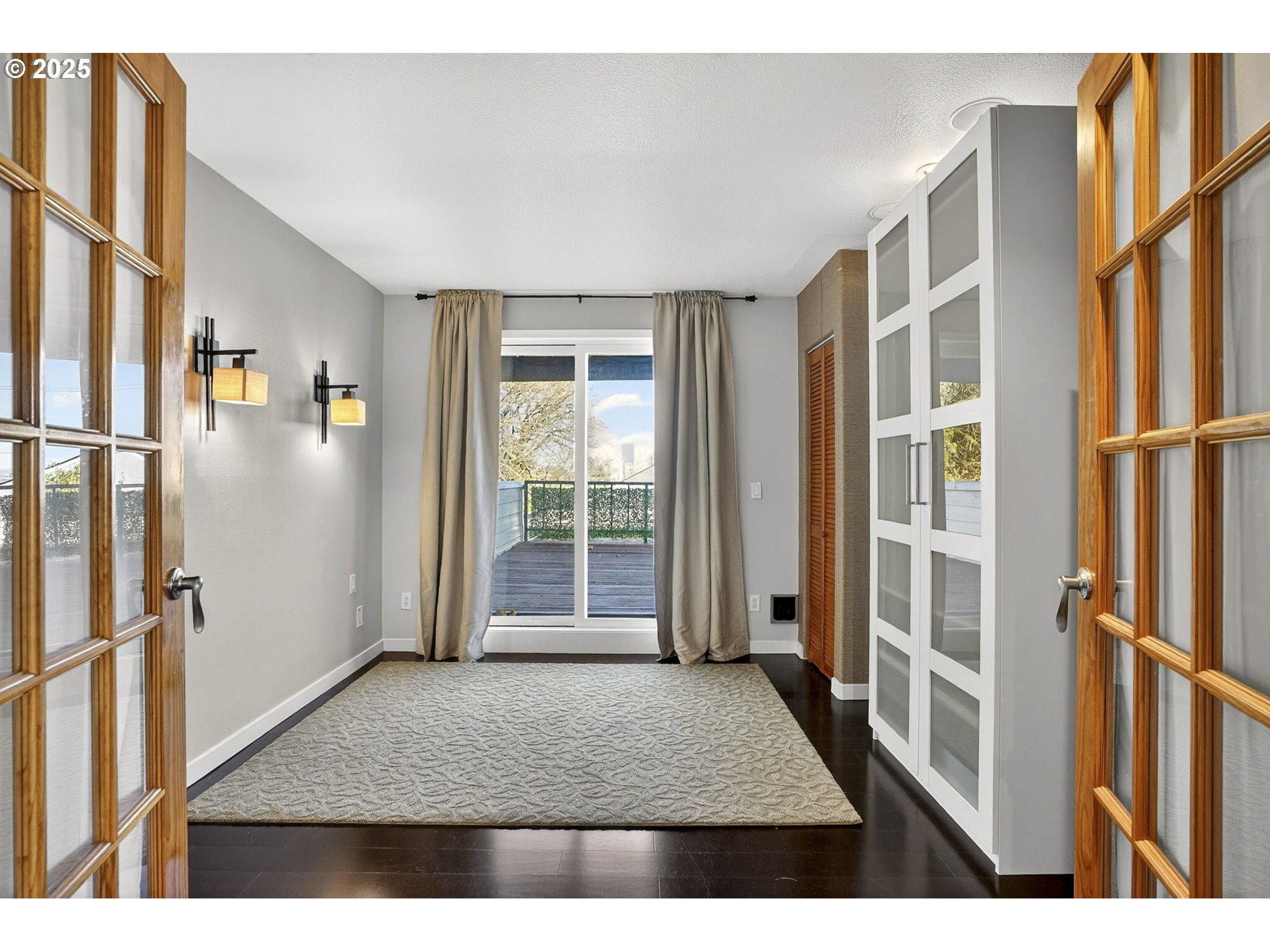 3515 Southwest Barbur Boulevard, Unit R2 Portland, OR 97239 - Photo 25 of 35 a view of an entryway with wooden floor