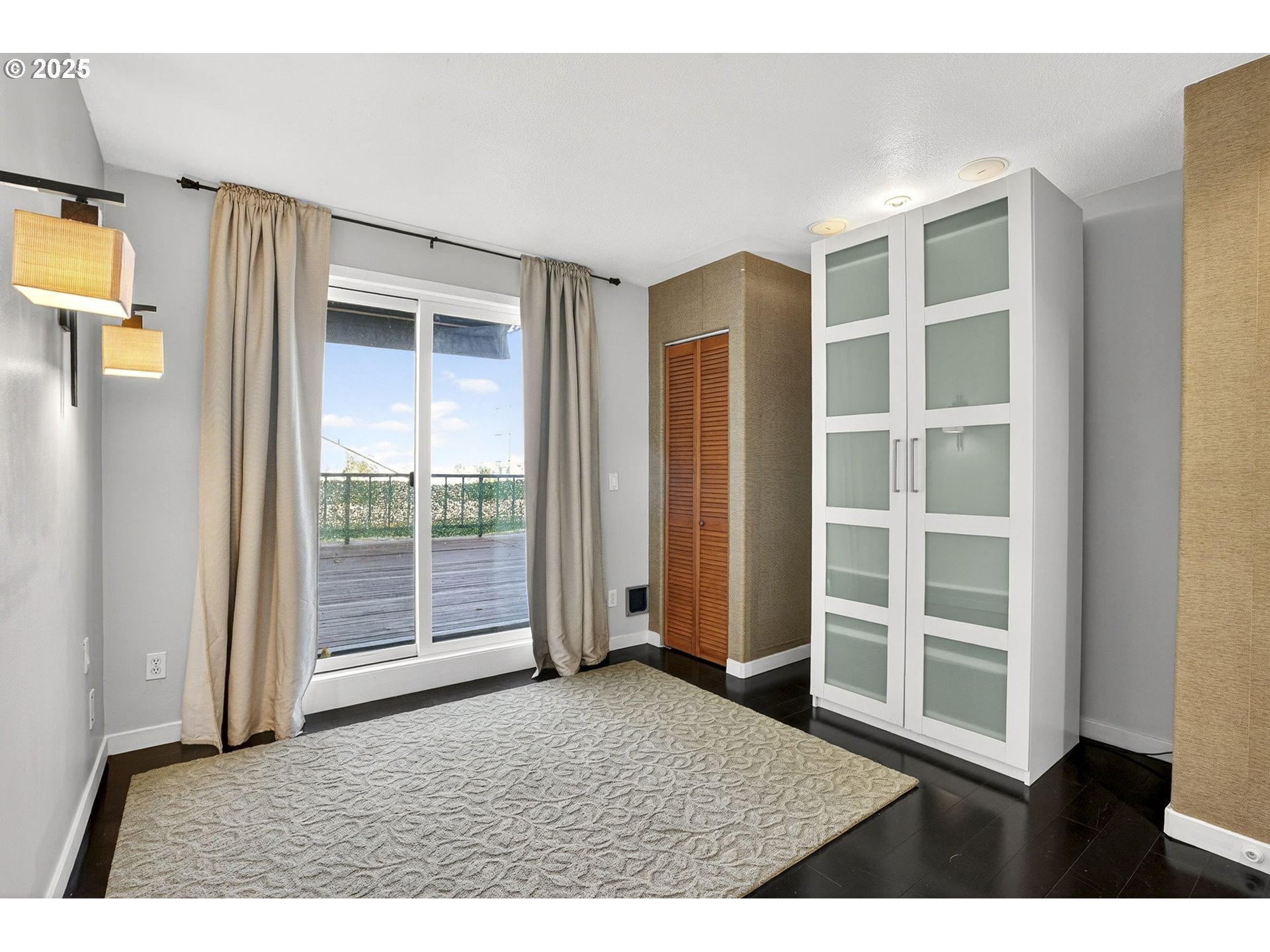 3515 Southwest Barbur Boulevard, Unit R2 Portland, OR 97239 - Photo 26 of 35 a living room with a large window