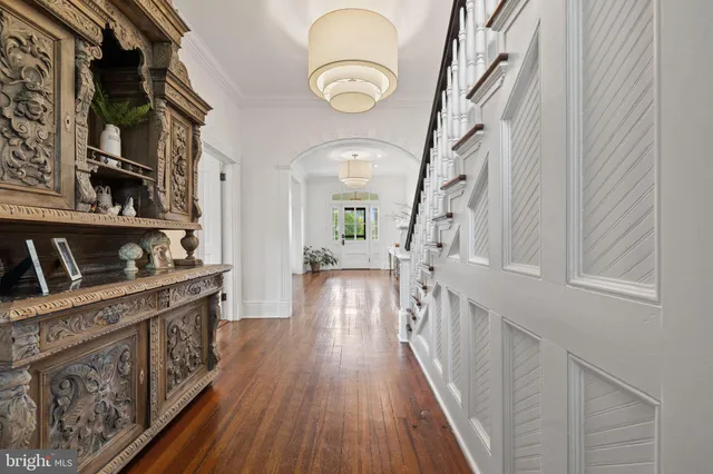 a view of an entryway with a kitchen