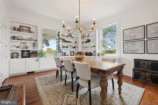 a view of a chairs and table in the garden