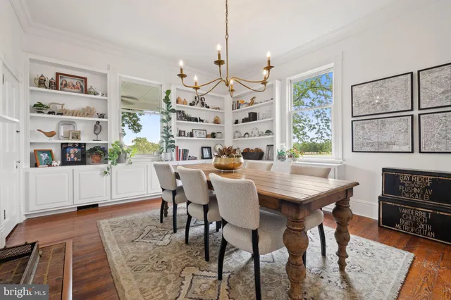 a view of a chairs and table in the garden
