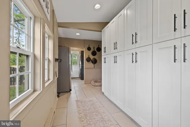 a bathroom with a shower and a sink