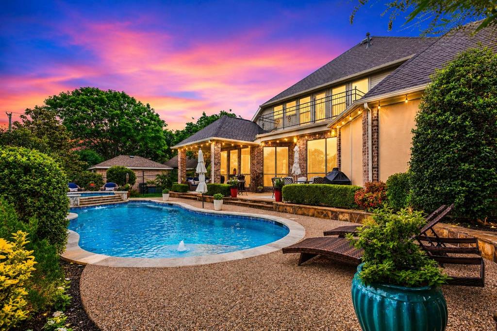 8517 Navigation Drive Rowlett, TX 75088 - Photo 18 of 39 a view of swimming pool with outdoor seating and plants