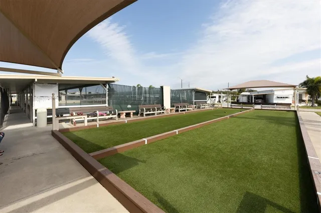 a view of a big area with table and chairs
