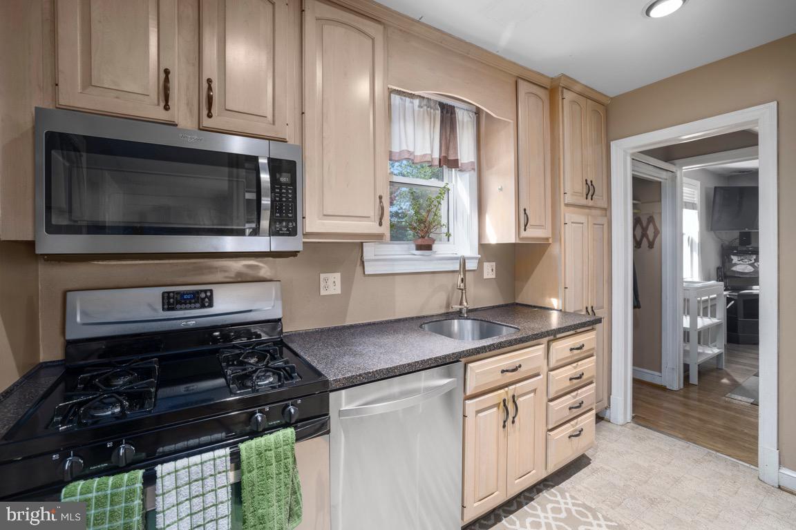 2406 Homestead Drive Silver Spring, MD 20902 - Photo 9 of 41 Charming cabinetry and stainless appliances.