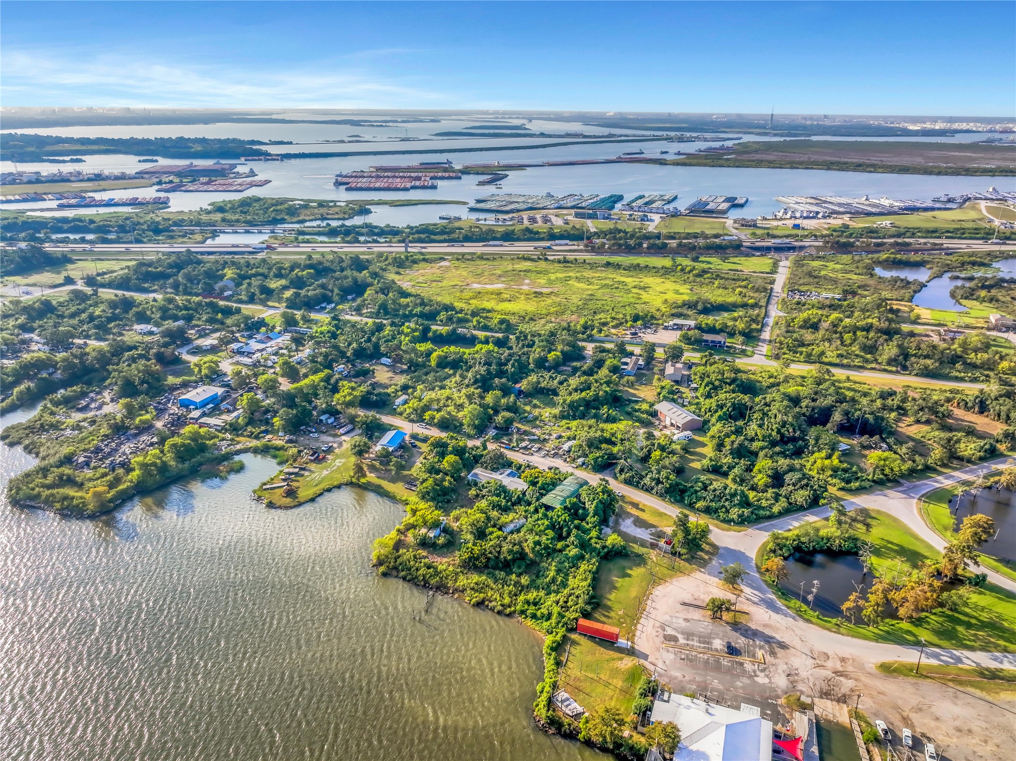 17512 River Road Channelview, TX 77530 - Photo 23 of 27 a view of a swimming pool and an outdoor seating