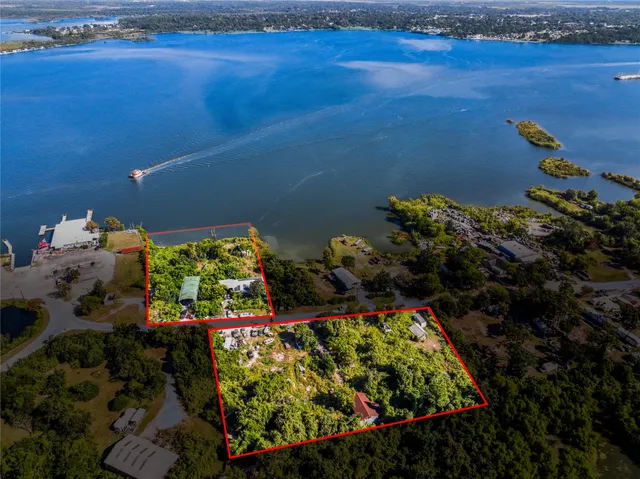 view of a lake with an outdoor space