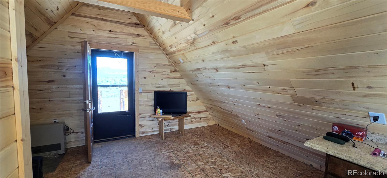 101 MacArthur Road Fort Garland, CO 81133 - Photo 12 of 21 a view of room with window and furniture