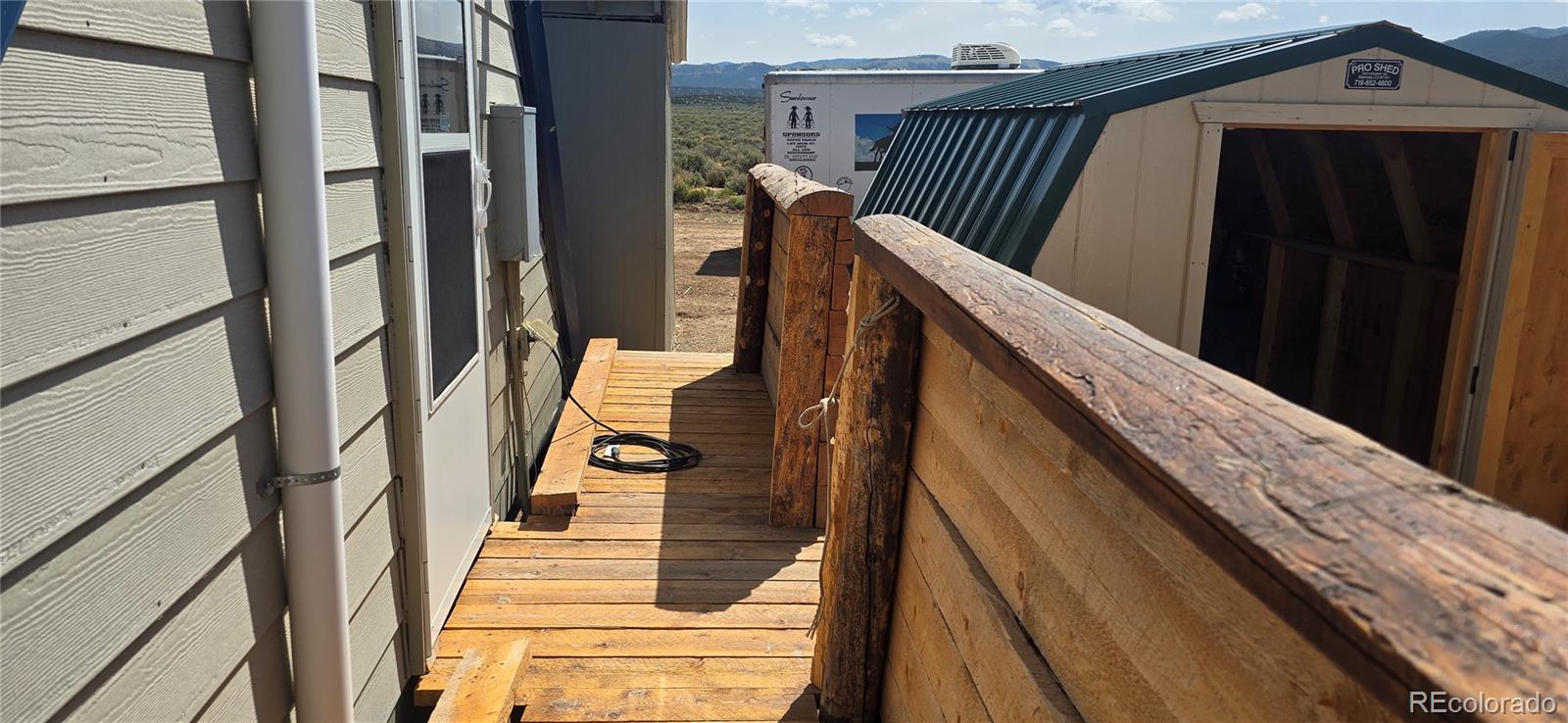 101 MacArthur Road Fort Garland, CO 81133 - Photo 13 of 21 a view of balcony with wooden floor
