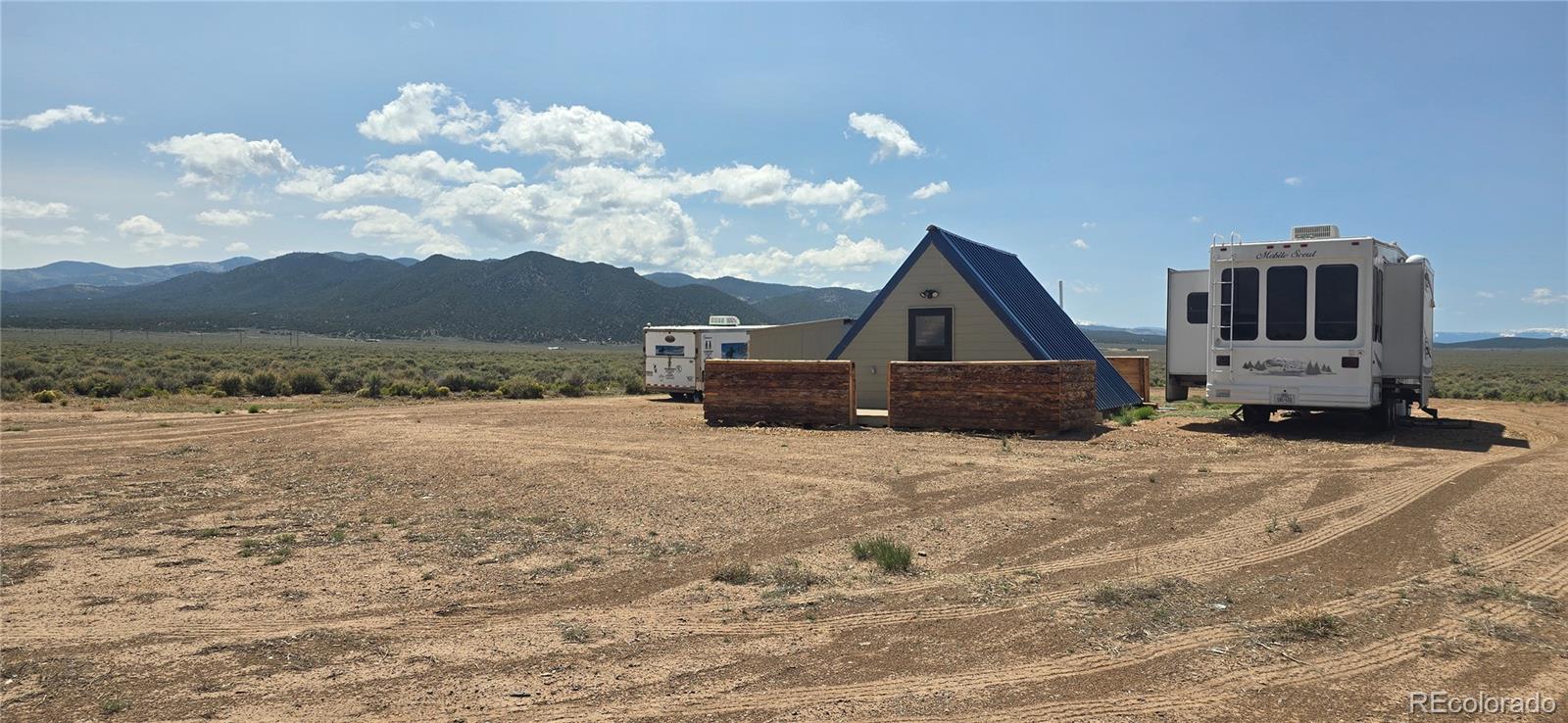 101 MacArthur Road Fort Garland, CO 81133 - Photo 19 of 21 a front view of a house with a yard