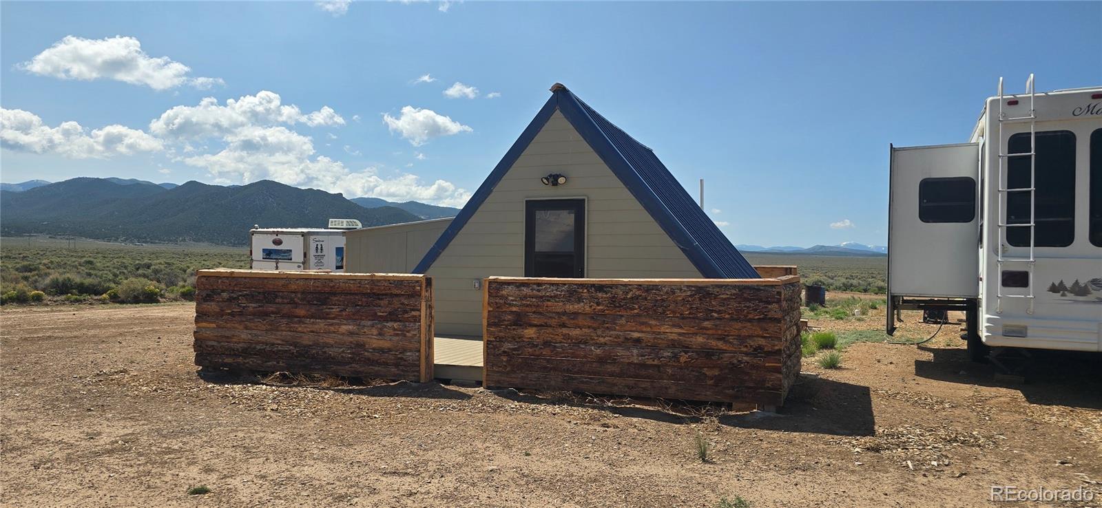 101 MacArthur Road Fort Garland, CO 81133 - Photo 21 of 21 a front view of a house with a yard