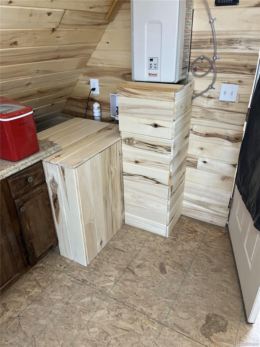 101 MacArthur Road Fort Garland, CO 81133 - Photo 6 of 21 a utility room with dryer and washer