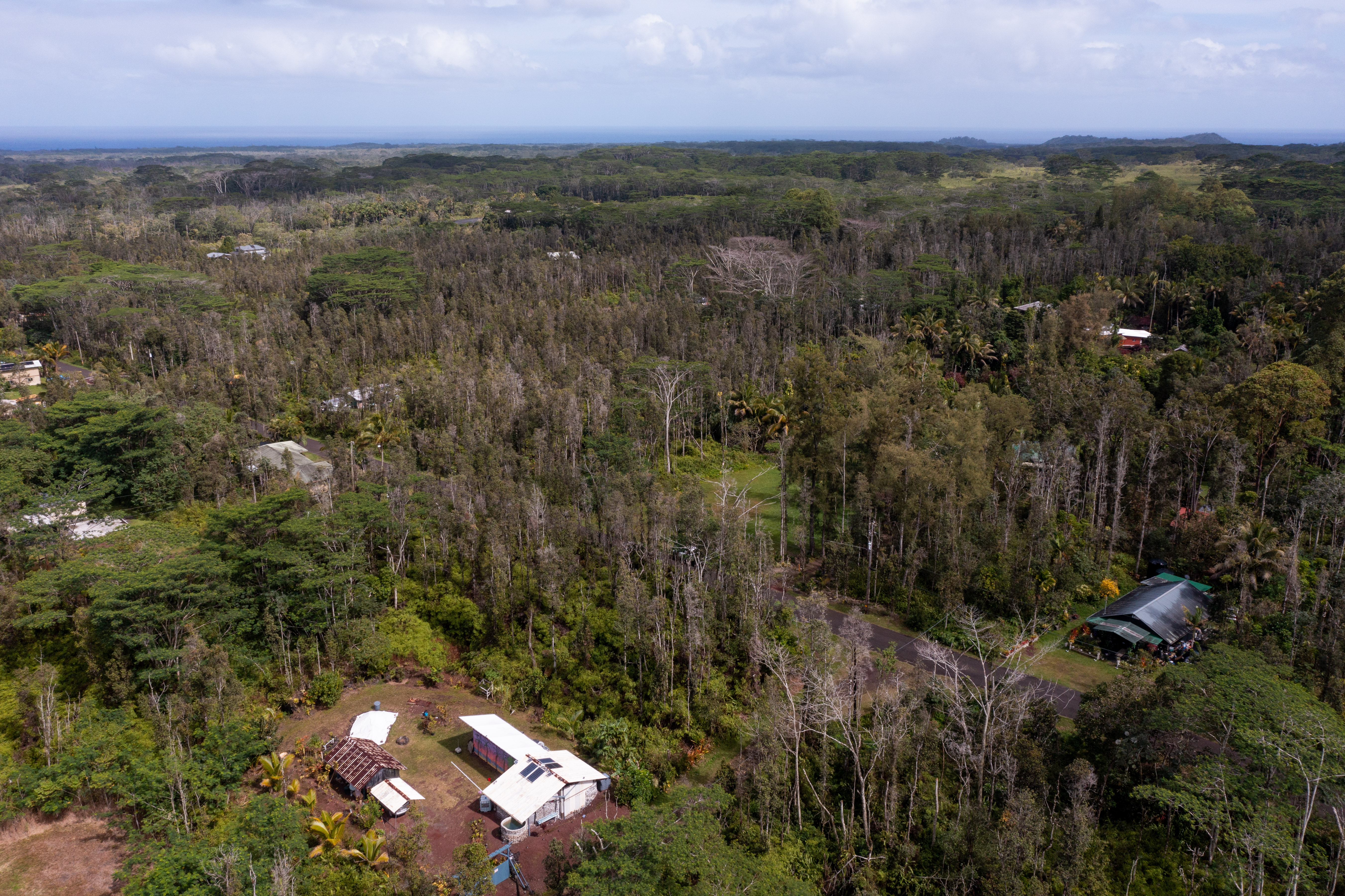 43 Seadrift Road Pahoa, HI 96778 - Photo 11 of 22 a view of a city with lush green forest