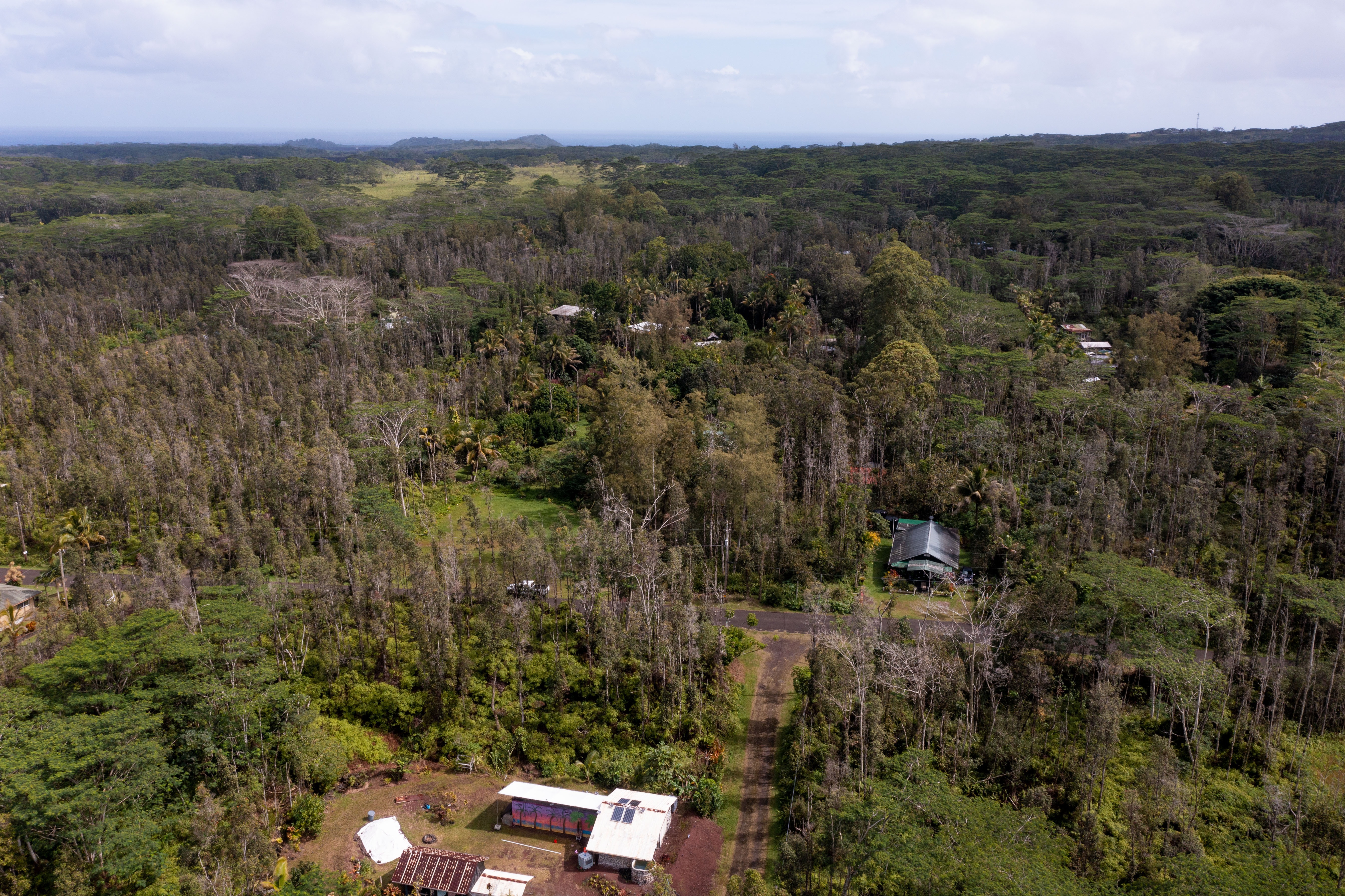 43 Seadrift Road Pahoa, HI 96778 - Photo 13 of 22 an aerial view of a house with a yard