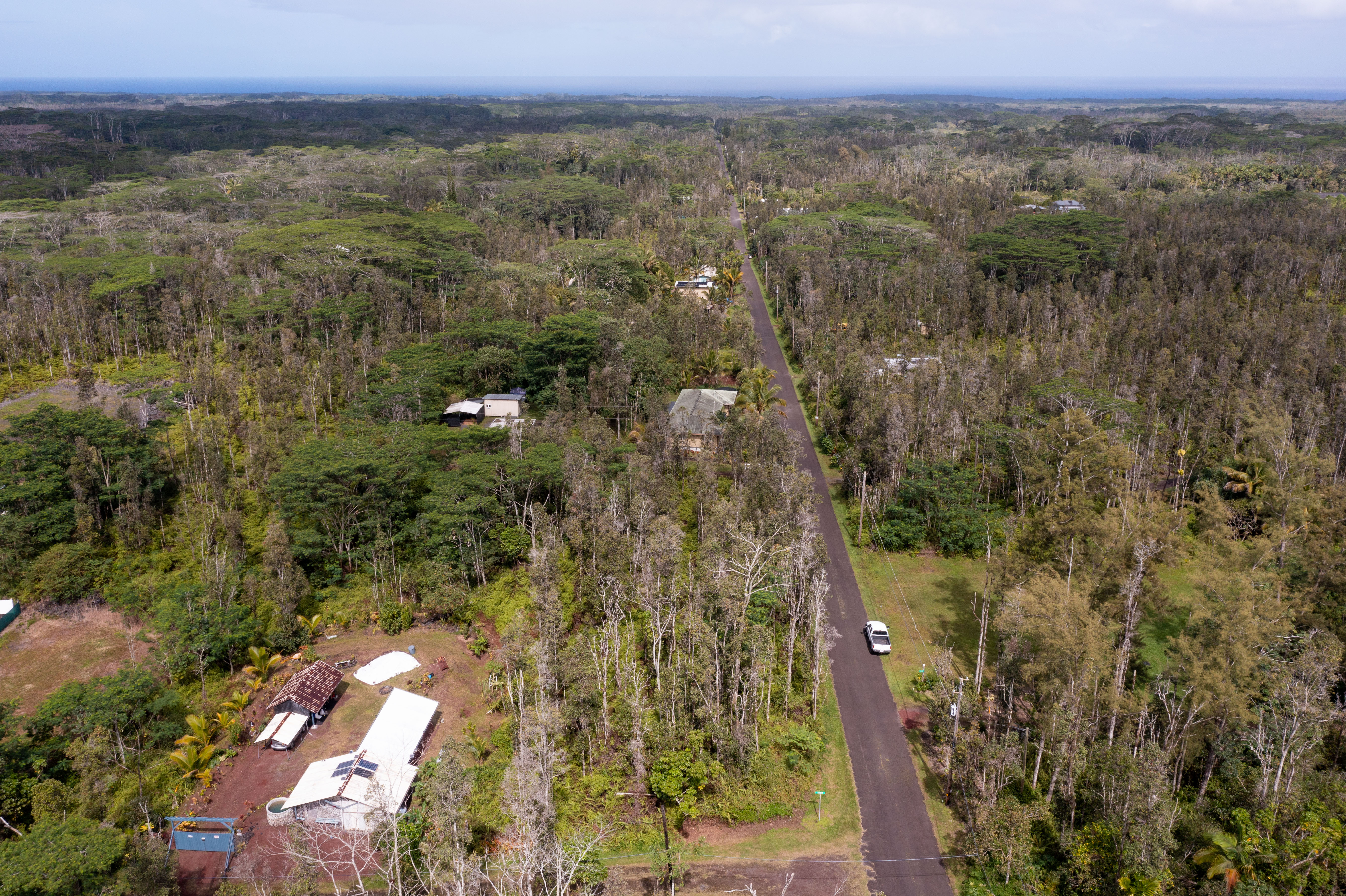 43 Seadrift Road Pahoa, HI 96778 - Photo 8 of 22 a view of a city with lush green forest