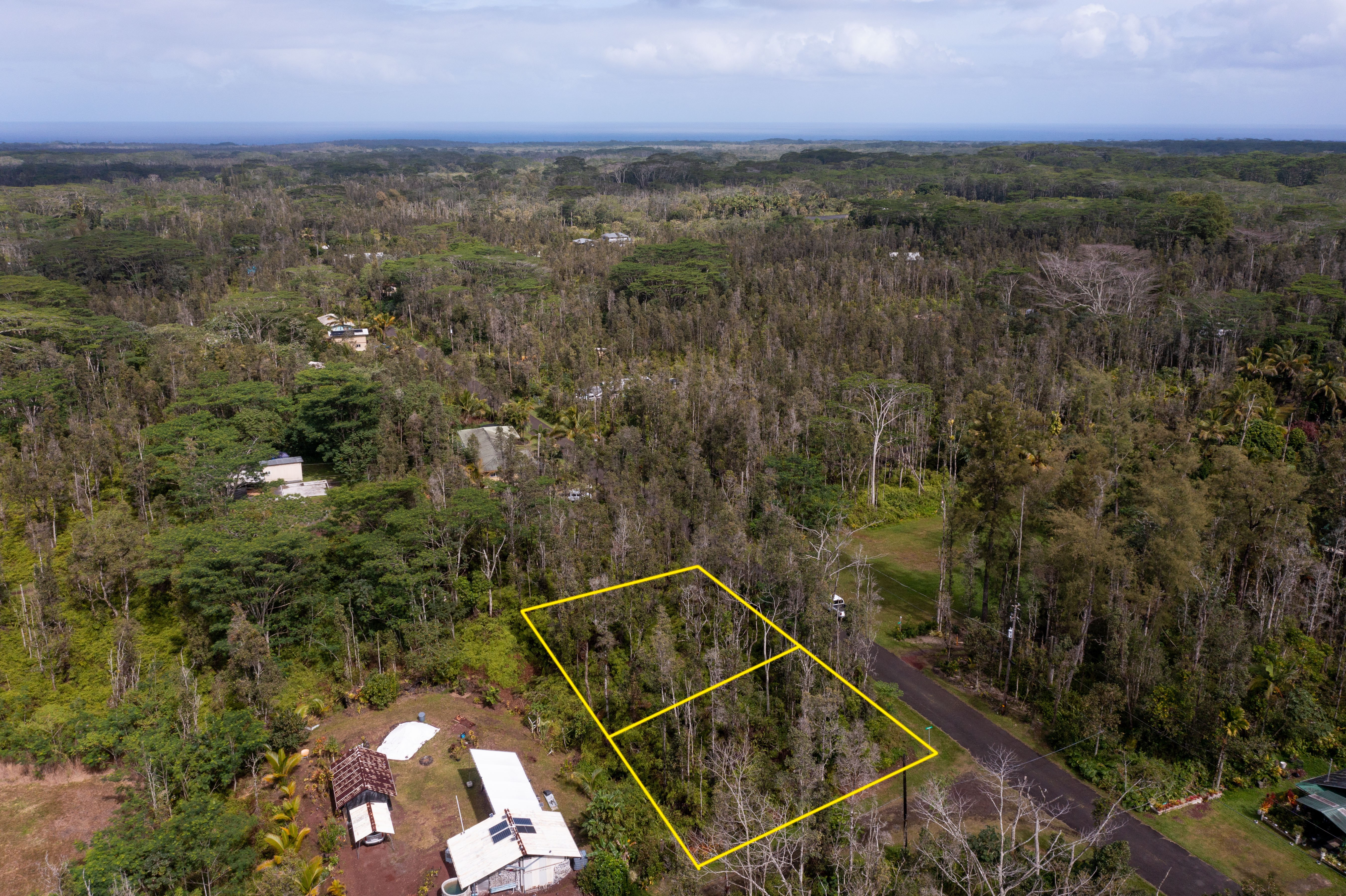 43 Seadrift Road Pahoa, HI 96778 - Photo 10 of 22 an aerial view of a house with a yard and lake view