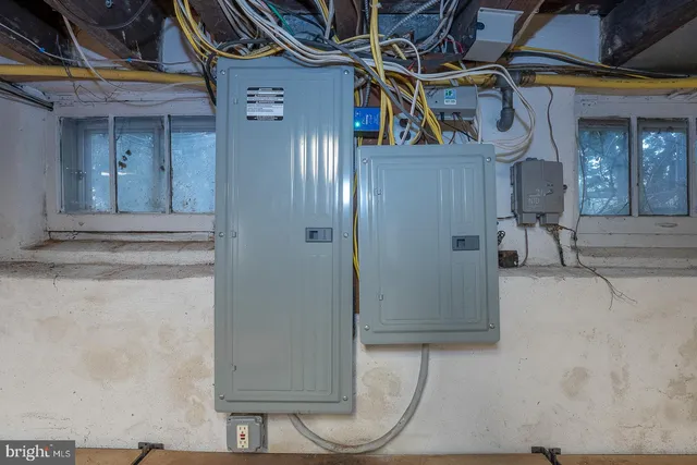 a view of a room with wooden walls