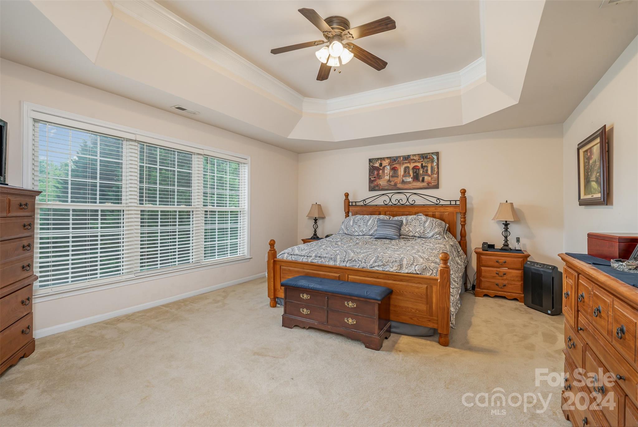 1814 Montague Road Clover, SC 29710 - Photo 15 of 33 a spacious bedroom with a bed and a chandelier