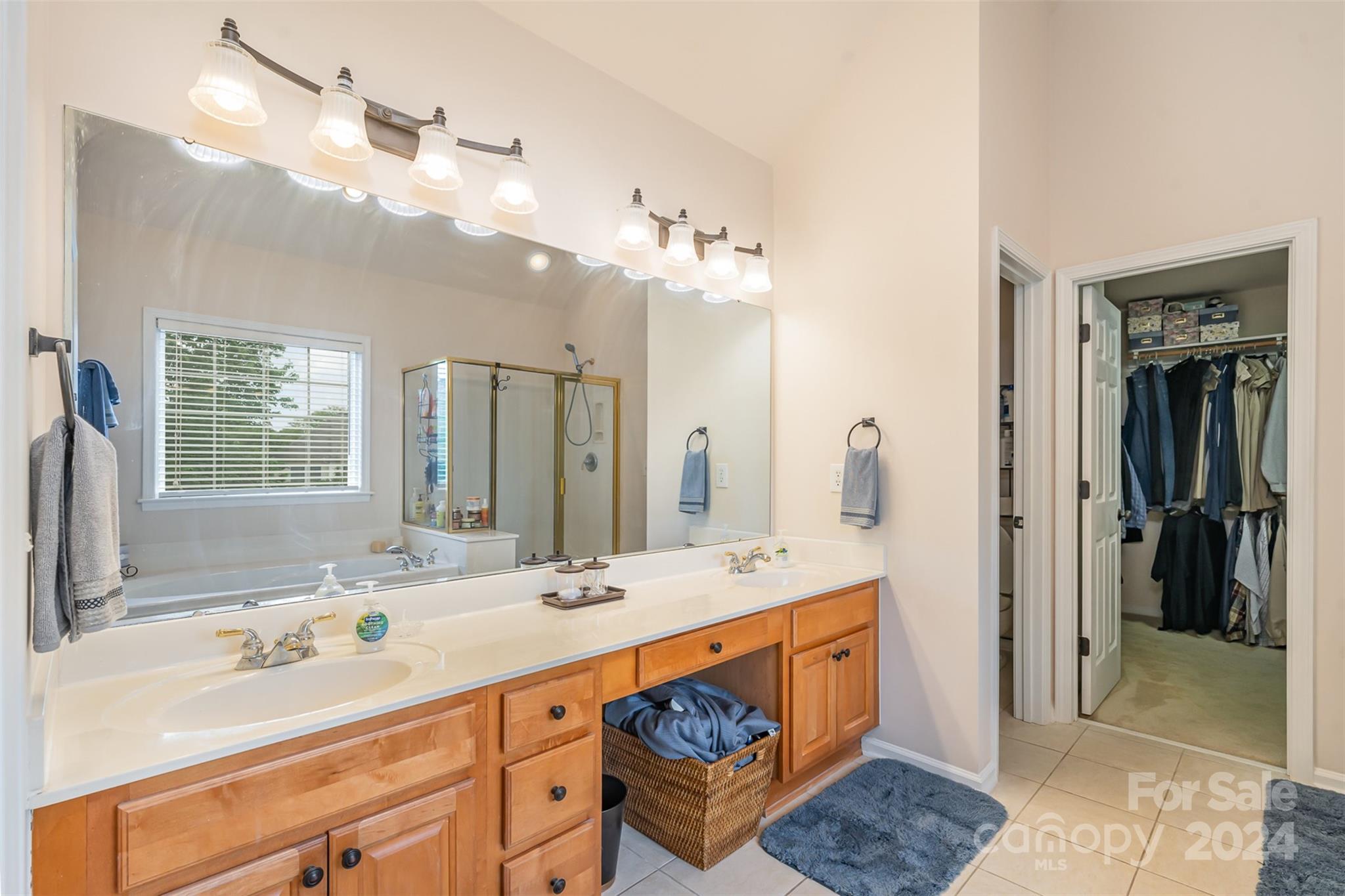 1814 Montague Road Clover, SC 29710 - Photo 17 of 33 a bathroom with a sink double vanity and a mirror