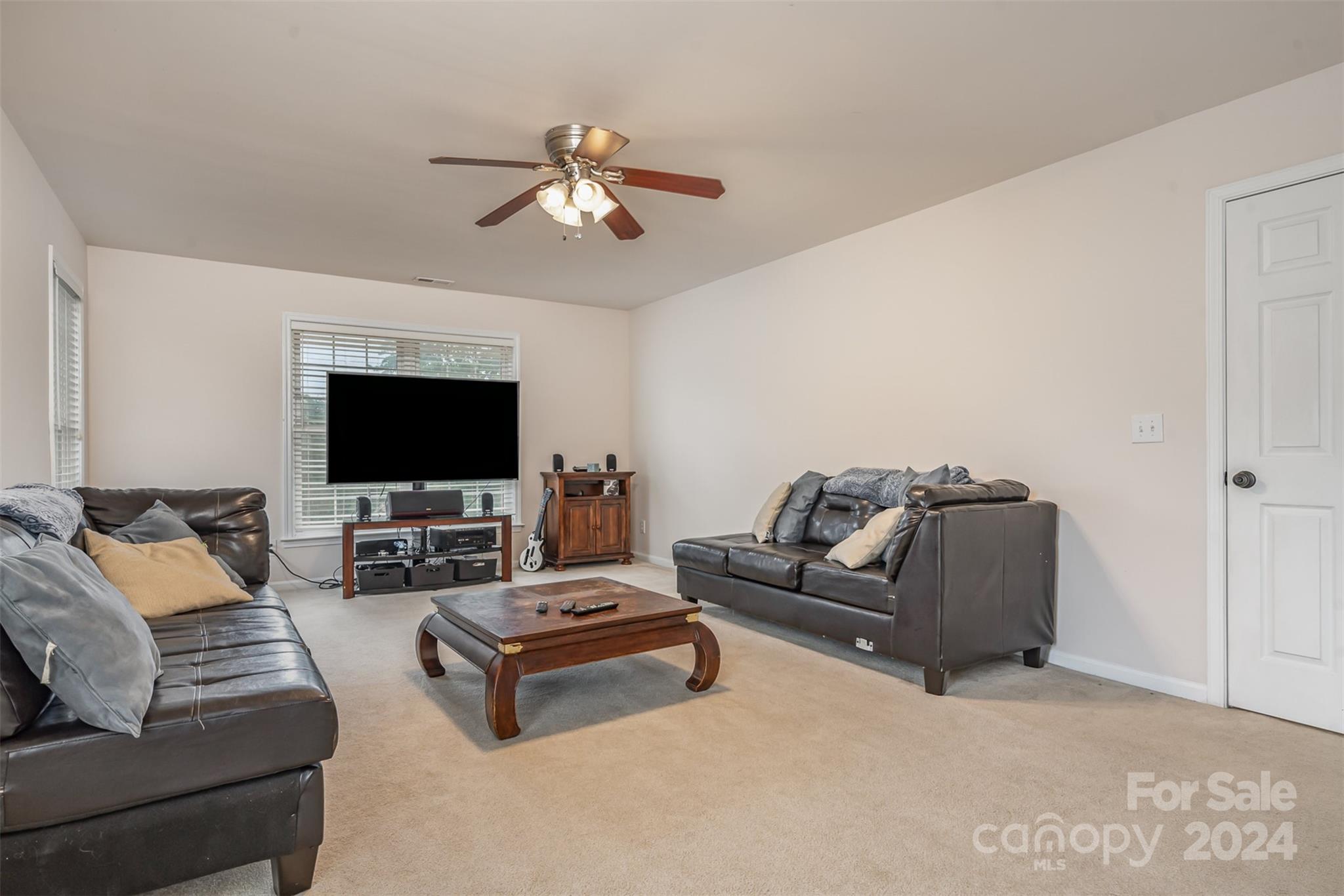 1814 Montague Road Clover, SC 29710 - Photo 19 of 33 a living room with furniture and a flat screen tv