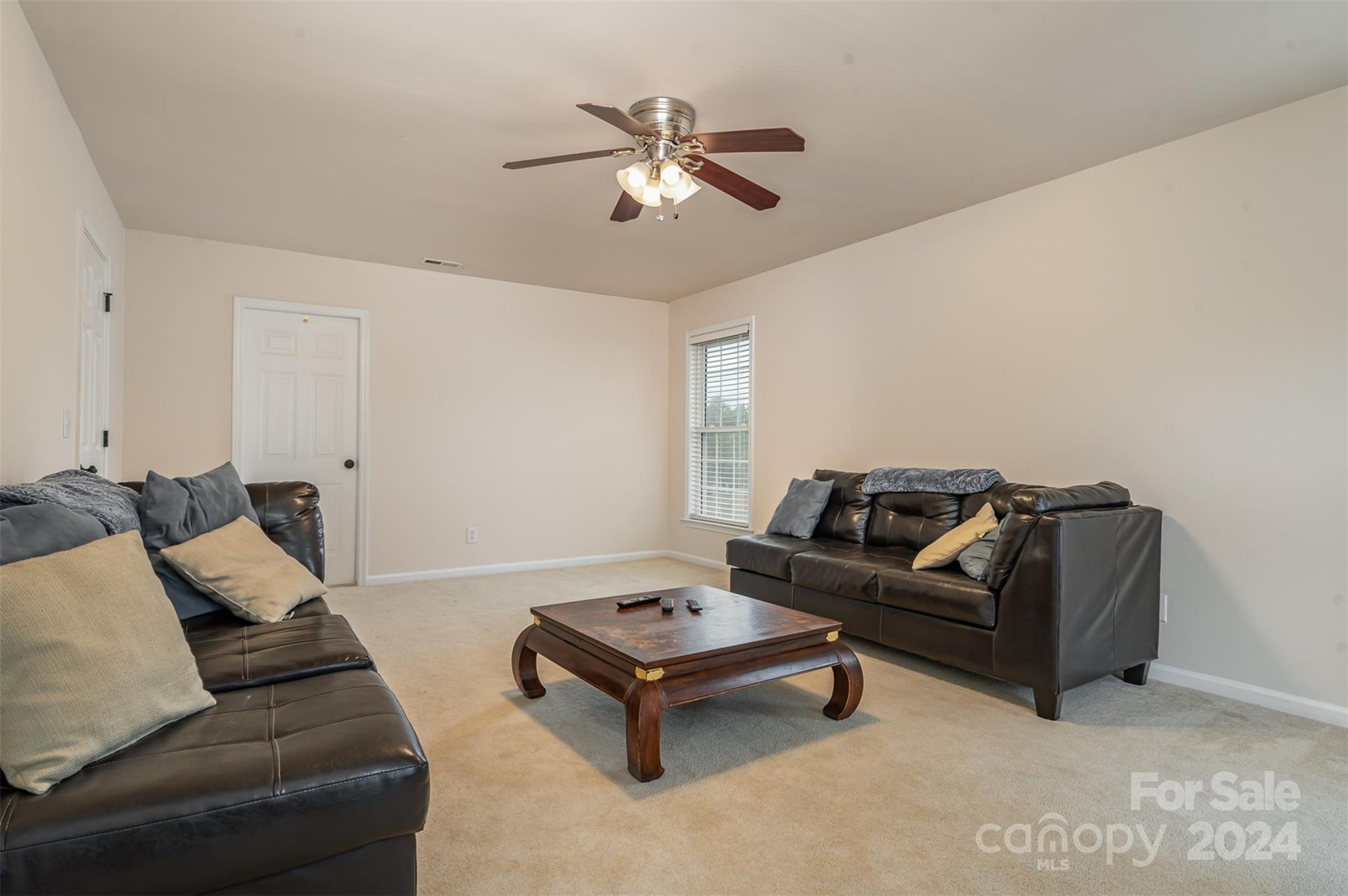 1814 Montague Road Clover, SC 29710 - Photo 20 of 33 a living room with furniture and a ceiling fan