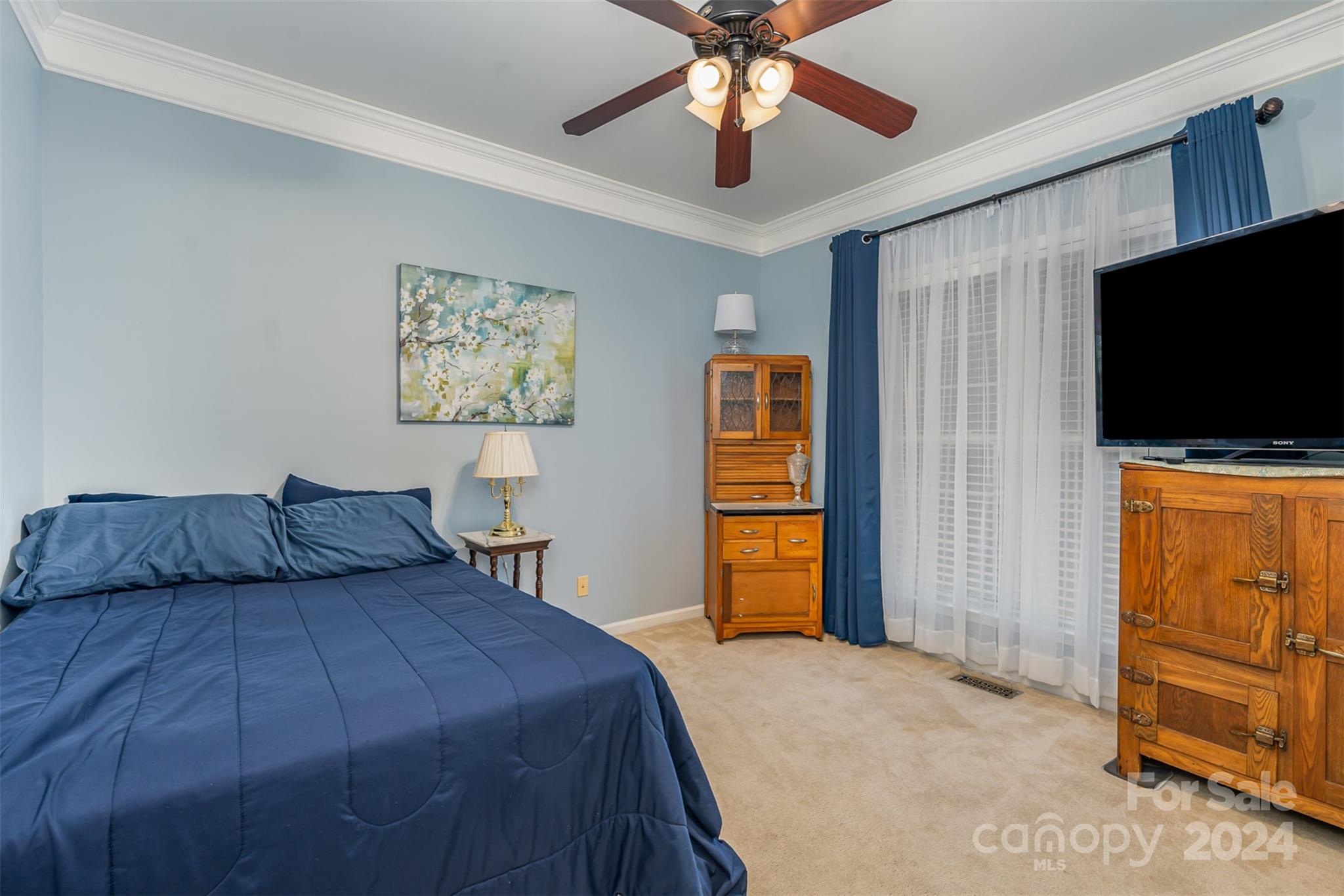 1814 Montague Road Clover, SC 29710 - Photo 27 of 33 a bedroom with a bed and a flat screen tv